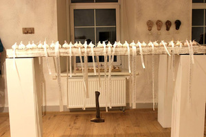 Garlic bed. Fragment from the exhibition at the Menų tiltas gallery in Vilnius. Gabija Černeckaitė's photograph