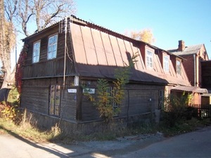 House with broken-form roof House with broken-form roof